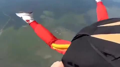 Instructor saves skydiver MID AIR that could not get her chute to open.