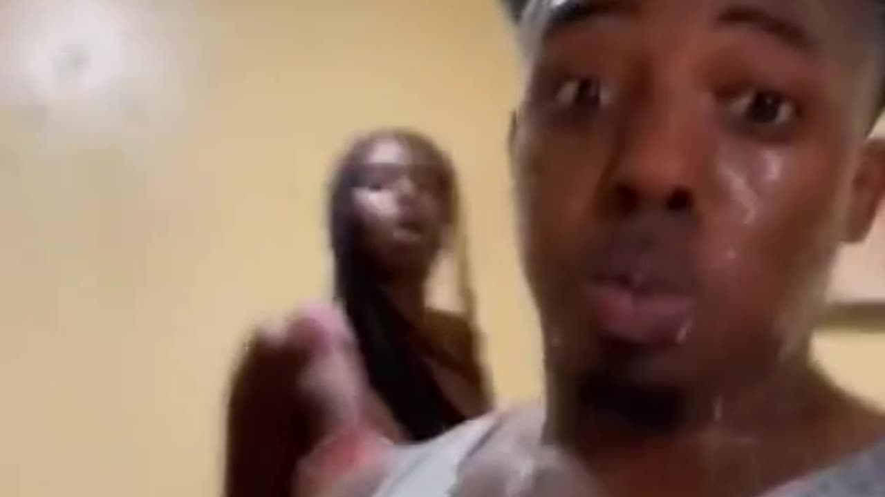 Spilling drink while mopping prank