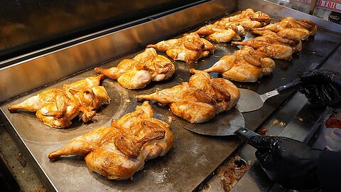 Crispy rice with grilled chicken on an iron plate