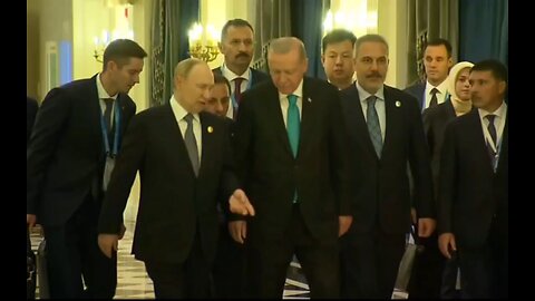 Firm handshake and small talk between Putin & Erdogan