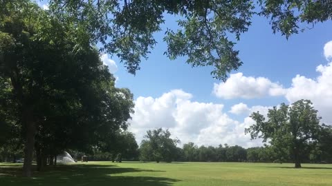 Blue sky ,white clouds ,green grass