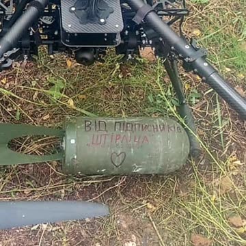 Heavy Bomber Drone Dropping Massive Shell onto Russian Positions