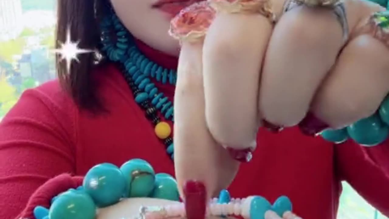 250326-4 This parent - child bracelet features Sleeping Beauty turquoise