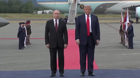 WATCH-Trump-Putin-Walk-From-Separate-Planes-to-Meet