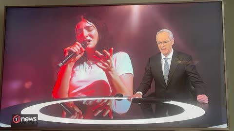 Was TV1's newsreader trying to be funny, blasphemous, or does he really worship a pop singer?