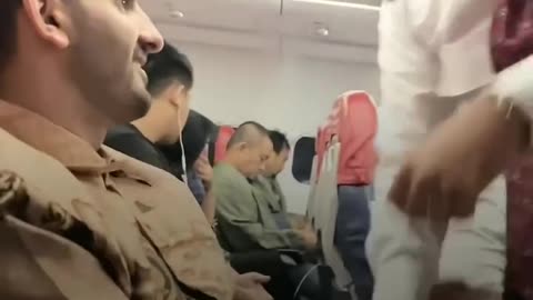 An Indonesian pilot greeted a Palestinian passenger Mahmoud Abdel Al