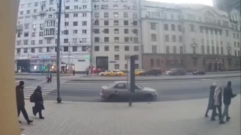 In Moscow, a police car struck a bike courie