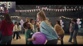 Woman With Blond Hair And A Tall Height In The Dating Market Plays The Pop The Balloon Game With Man