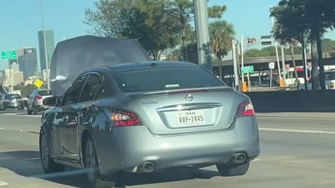Hood Popped Open on Freeway