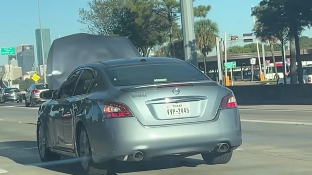 Hood Popped Open on Freeway