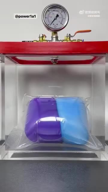 Vacuum sealing 2 balloons then putting them in a vacuum chamber