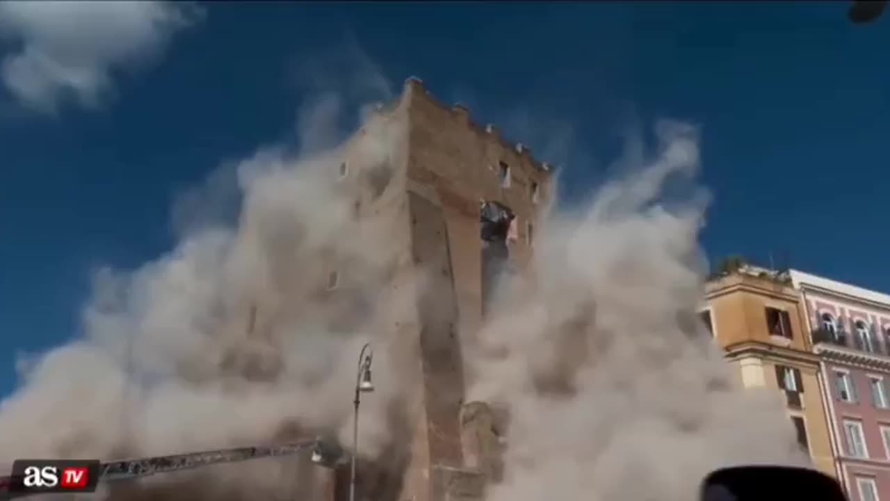 "A worker was killed and several others were injured when part of a historic tower in central Rome
