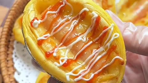 Pastry dough with sausage and cheese with sauce and mayo