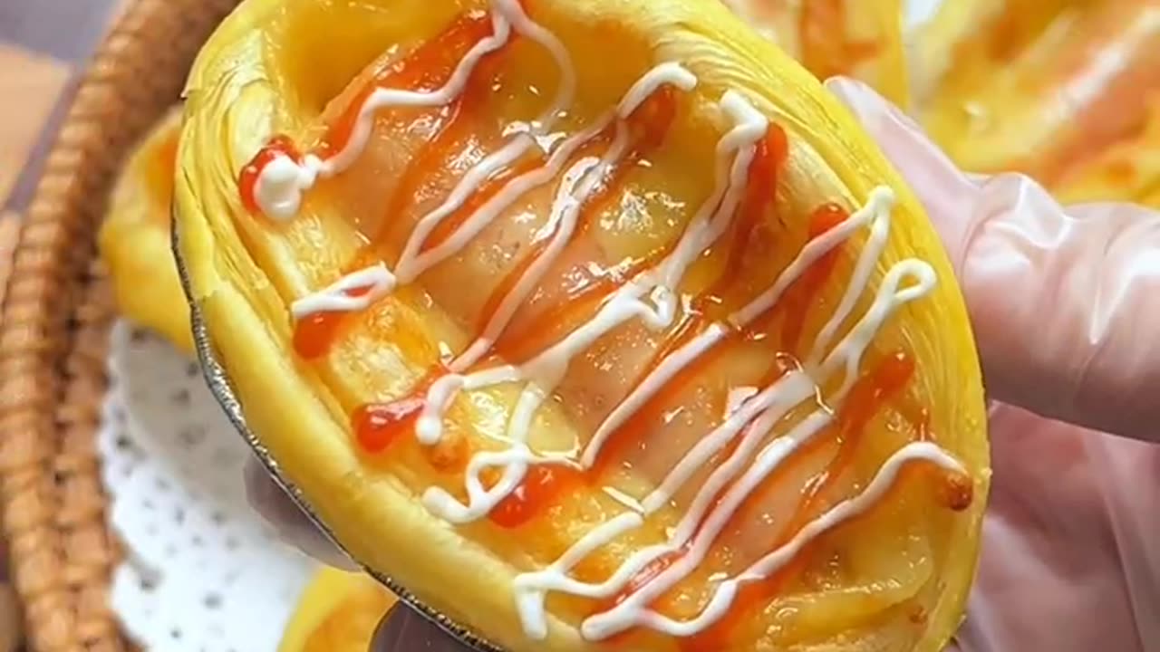 Pastry dough with sausage and cheese with sauce and mayo