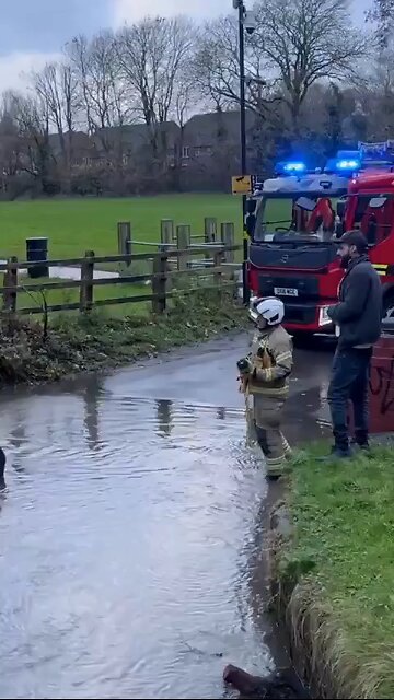 In England, a woman called the rescuers after driving into a deep puddle.