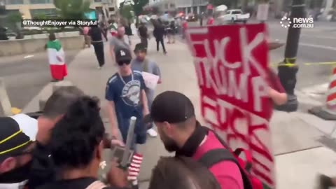 Chaos erupts after shooter opens fire at anti-Trump rally - news.com.au (720p, h264)