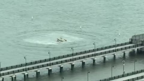 Helicopter crashes into Hudson River NY
