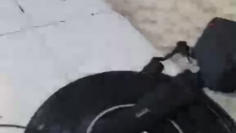 GoPro 11 camera, filming a video mounted on a iRobot Roomba vacuum cleaner