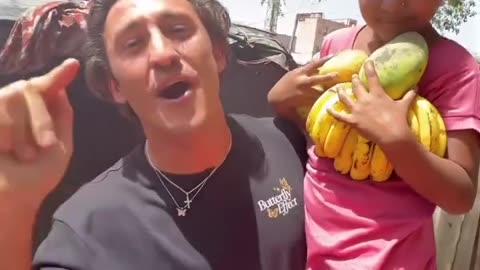 A poor little boy selling fruits to support his family…