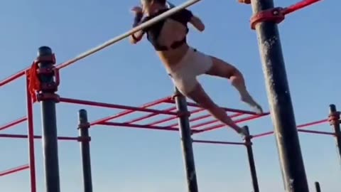 Girl on the Horizontal Bar Performs Miracles