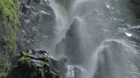 Water falling over stones
