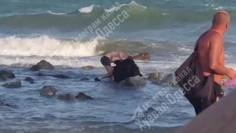 Man in Odessa Tries to Haul Away A Mine That Washed Ashore