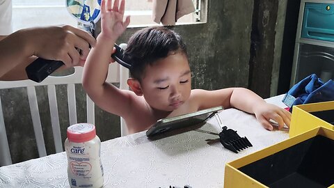 Cutting Baby Isaiah’s Hair While Watching Cartoons ✂️📱