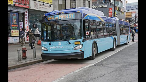 New style New York City easy-entry articulated bus on Main Street in Chinatown, Flushing, Queens, Ne