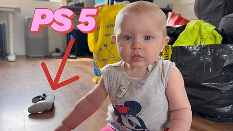 Adorable 7 Month Old Baby Plays with PS5 Controller – Baby Gamer in the Making!