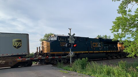 Barely caught CSX Trains 700 and 3355 as we raced to the crossing
