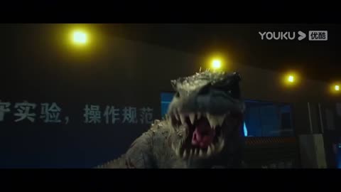 The mutant giant snake battles the Tyrannosaurus, triggering the Tyrannosaurus's