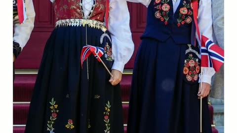 Members of the Norwegian royal family opened the art festival in traditional dress