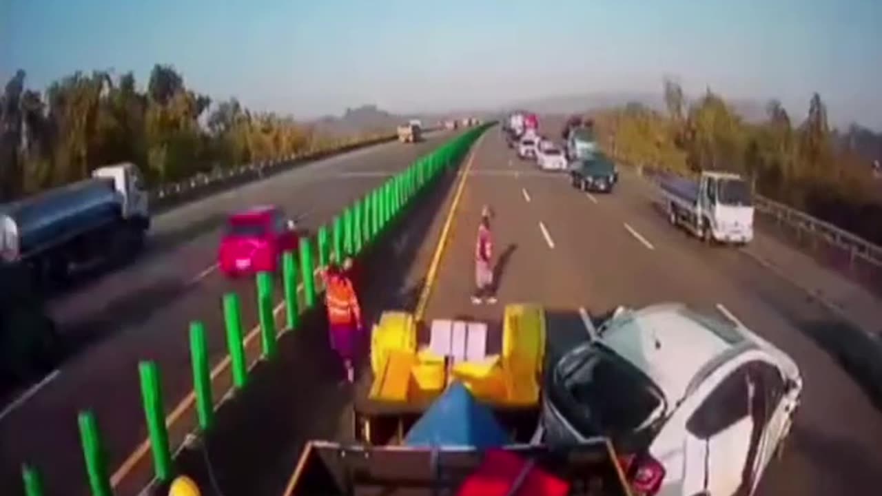 Two vehicles crash into a construction truck