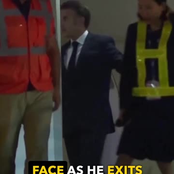 French First Lady Brigitte Macron appears to push Emmanuel Macron's face during a visit to Vietnam