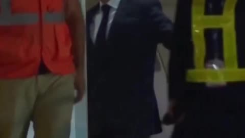 French First Lady Brigitte Macron appears to push Emmanuel Macron's face during a visit to Vietnam