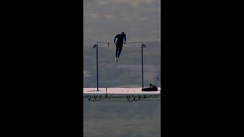 Russian stuntman Sergey Boytsov performs gymnastic turns under a balloon at 1,500 meters