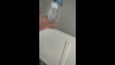 trying to flip the water bottle (failed)