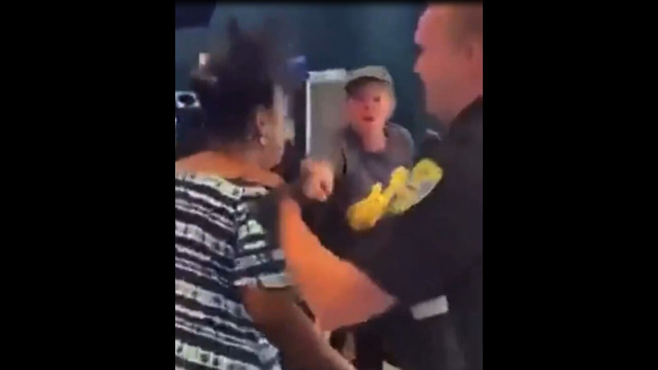 Karen attacks McDonald's employees right in front of police officer