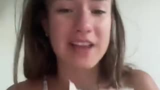 Young woman in Paris cries because the city is too Dangerous