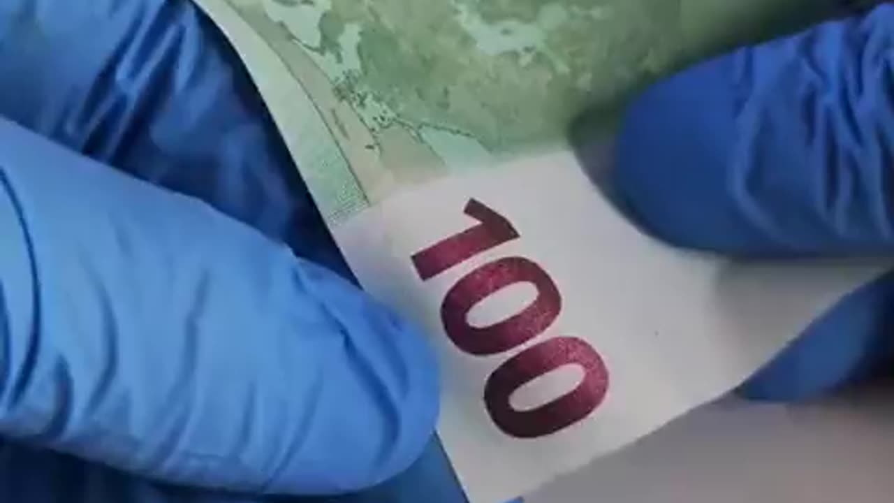 Hidden symbols on the 100 Euro banknote