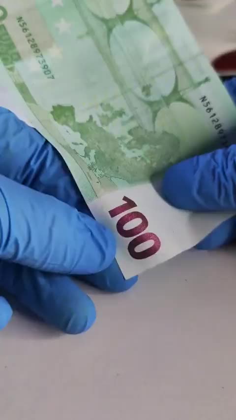 Hidden symbols on the 100 Euro banknote