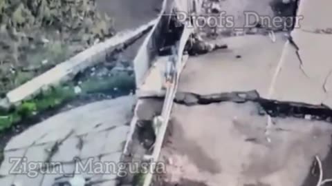 Russian Soldier Hit While Limping Across Destroyed Bridge