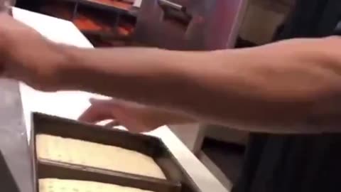 Detroit ball park worker arrested after video shows him spitting on food