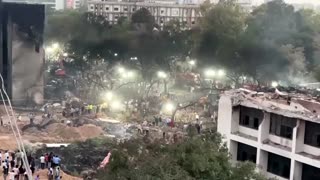 Air India crash survivor recounts escape as rescuers scour site