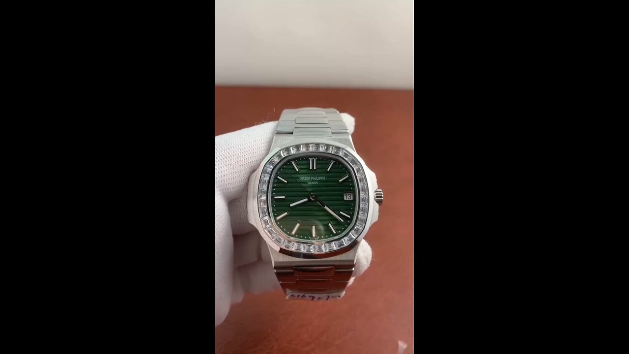 Patek Philippe Nautilus Baguette Set Bezel Green Dial. Reference 5711/1300A-001 5711