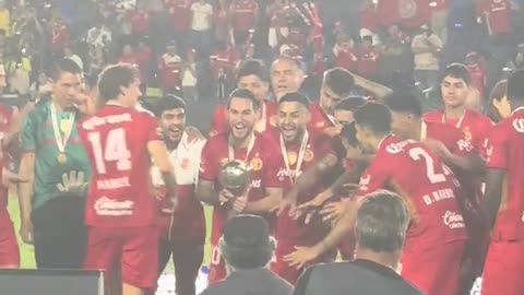 Toluca thrashes América and wins the Mexican soccer championship.