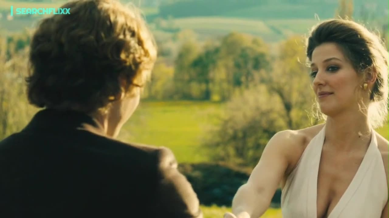 Marlene finds out she’s in the car with a Formula 1 driver.
