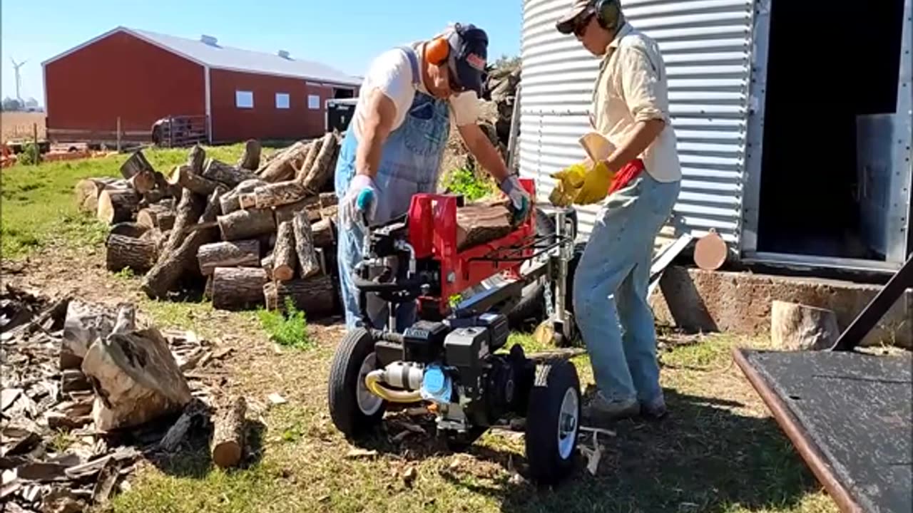 2 Way Splitter Splitting Wood for Storage in Farmers Bin