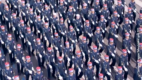Soldier bleeds, horse falls to ground in France's Bastille Day parade