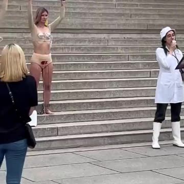 Vegans milk themselves in protest.